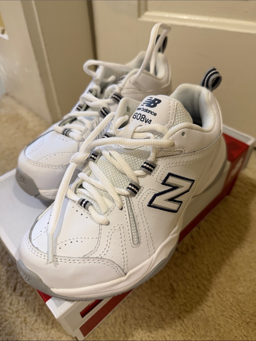 New Balance White Sneakers with Navy Accent